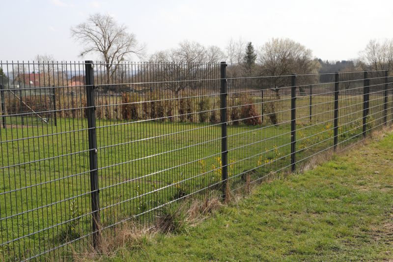 Hog Wire Fence Installation in Spring
